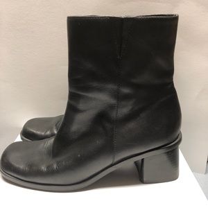 Black leather boots.